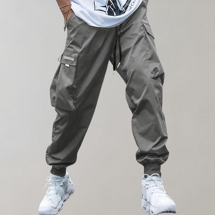 Drune | Lose Sitzende Cargohose mit Verstellbarem Kordelzug und Mehreren Taschen