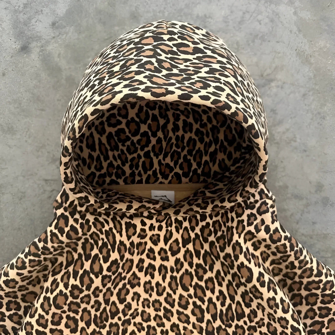Drune | Luxe Damen Kapuzenpullover mit Pantherdruck