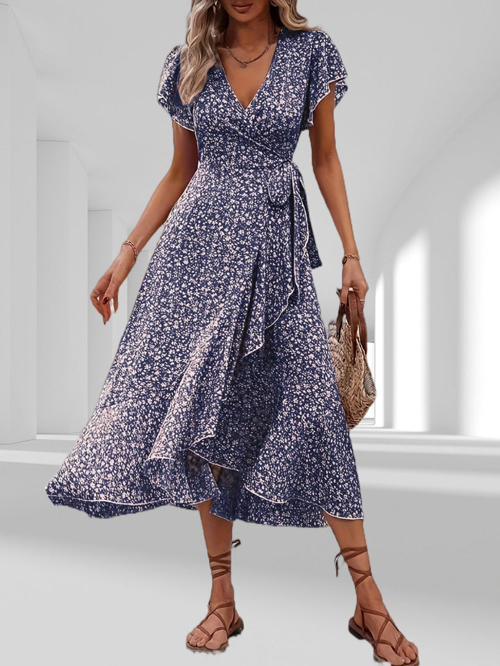 Drune | Adored By You Floral Midi Kleid mit Gänseblümchen