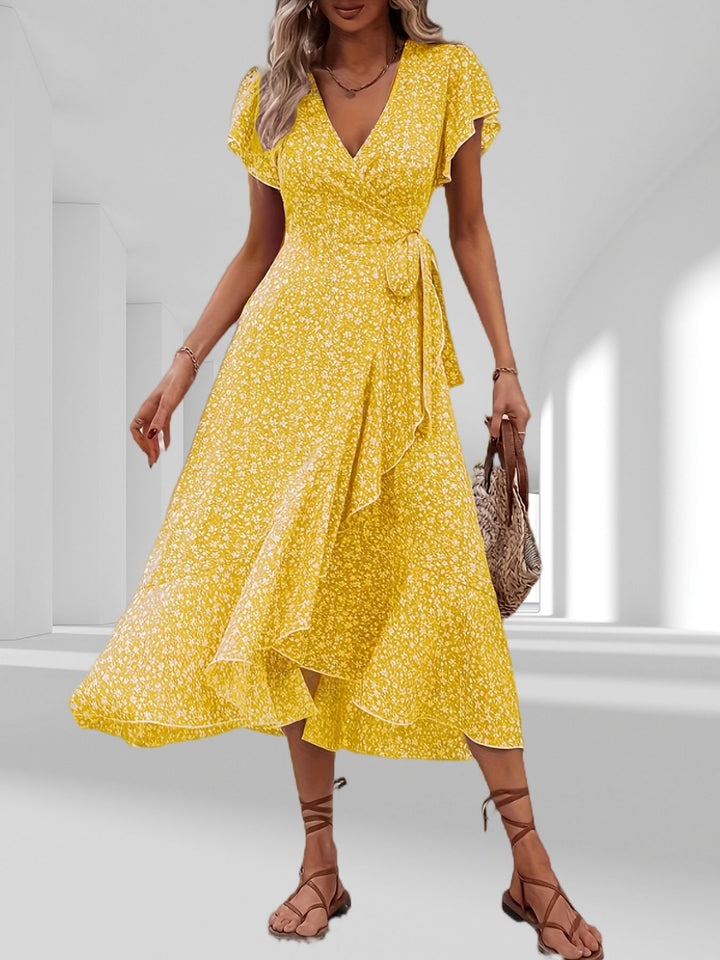 Drune | Adored By You Floral Midi Kleid mit Gänseblümchen