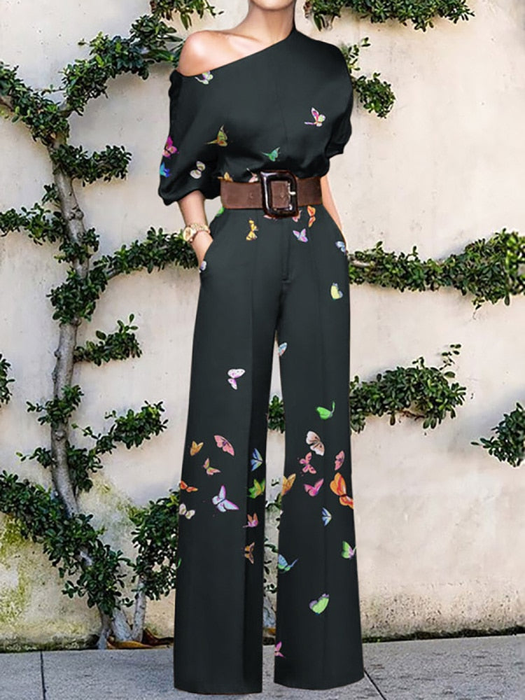 Drune | trägerloser Jumpsuit mit Blumenmuster