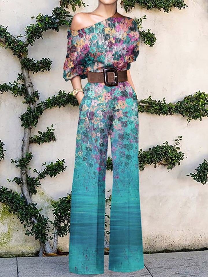 Drune | trägerloser Jumpsuit mit Blumenmuster