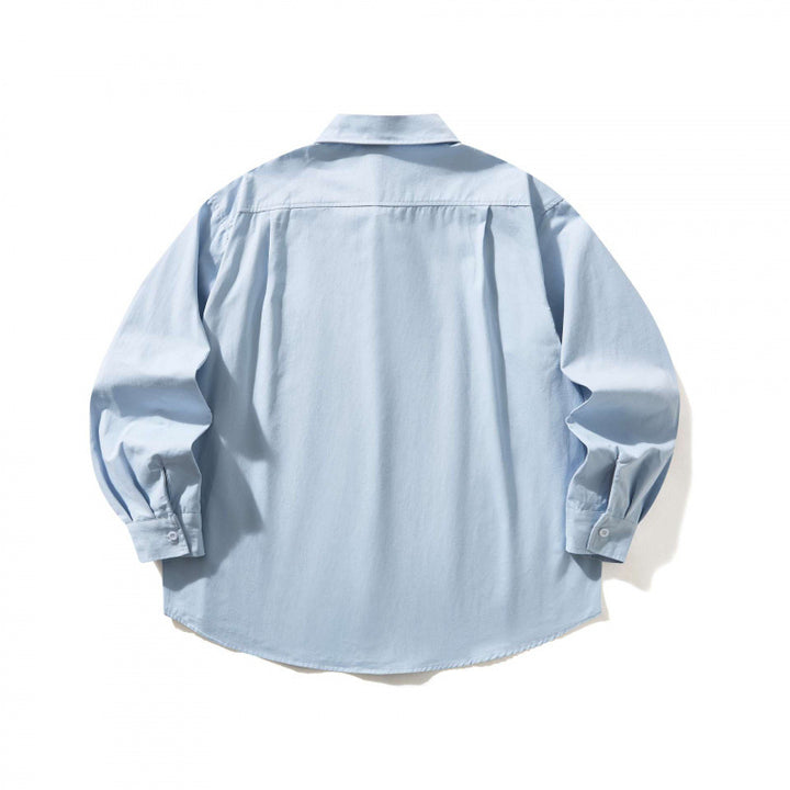 Unisex Oversize-Hemd mit Button-Down-Kragen, Brusttasche und gerundetem Saum Drune