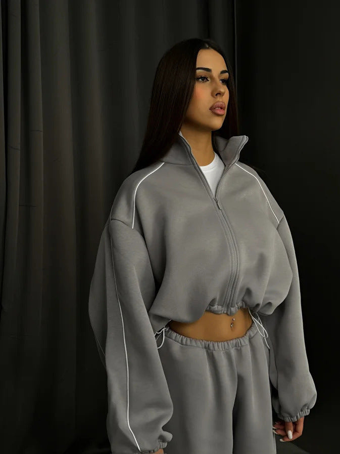 Damen cropped Zip-Kapuzenjacke mit Tunnelzug-Bund, oversized Ärmeln und kontrastierender Paspel Drune