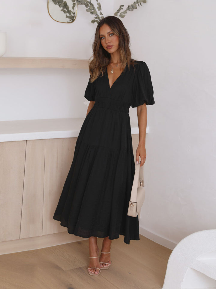 Damen Maxikleid mit tiefem V-Ausschnitt und voluminösen Puffärmeln Drune
