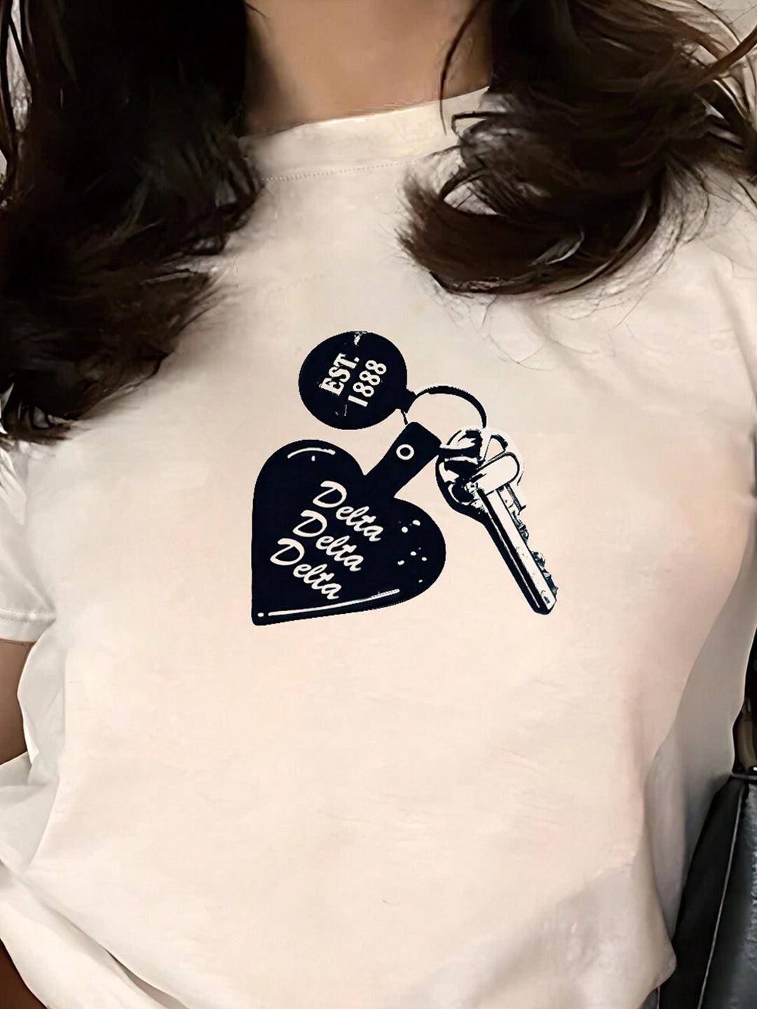 Damen T-Shirt mit kreativem Schlüsselherz-Motiv und modernem Print Drune
