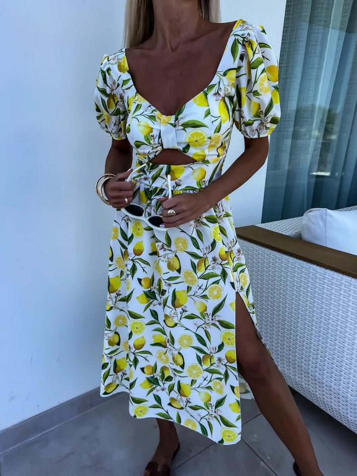 Damen Maxi Kleid mit Fruchtmotiv und Cut-Out-Details Drune