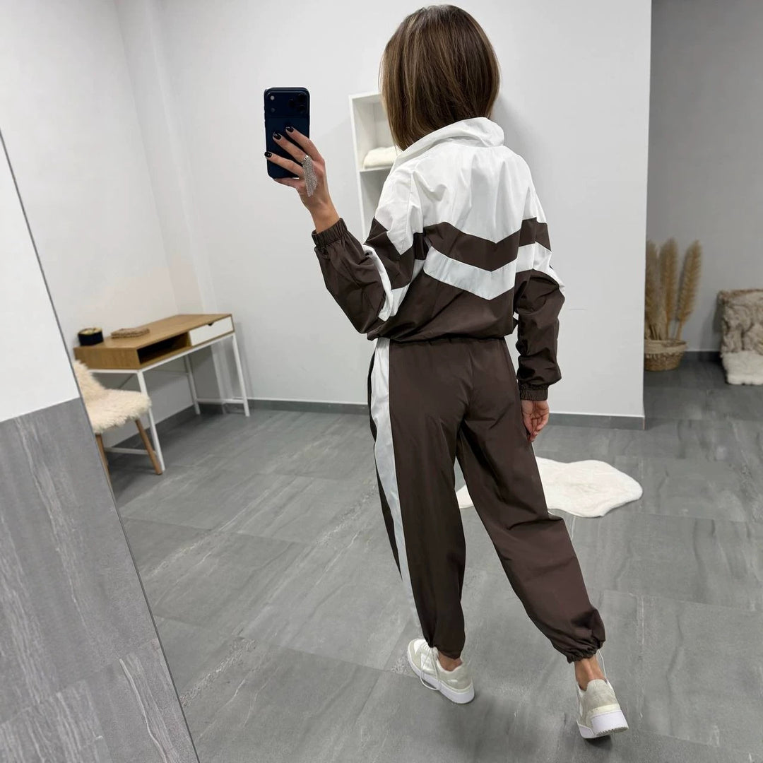 Damen retro Nylon-Trainingsanzug mit Kapuzen-Zipjacke und weiter hochgeschnittener Hose Drune
