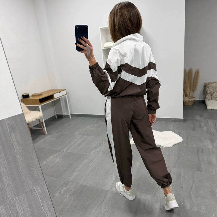 Damen retro Nylon-Trainingsanzug mit Kapuzen-Zipjacke und weiter hochgeschnittener Hose Drune