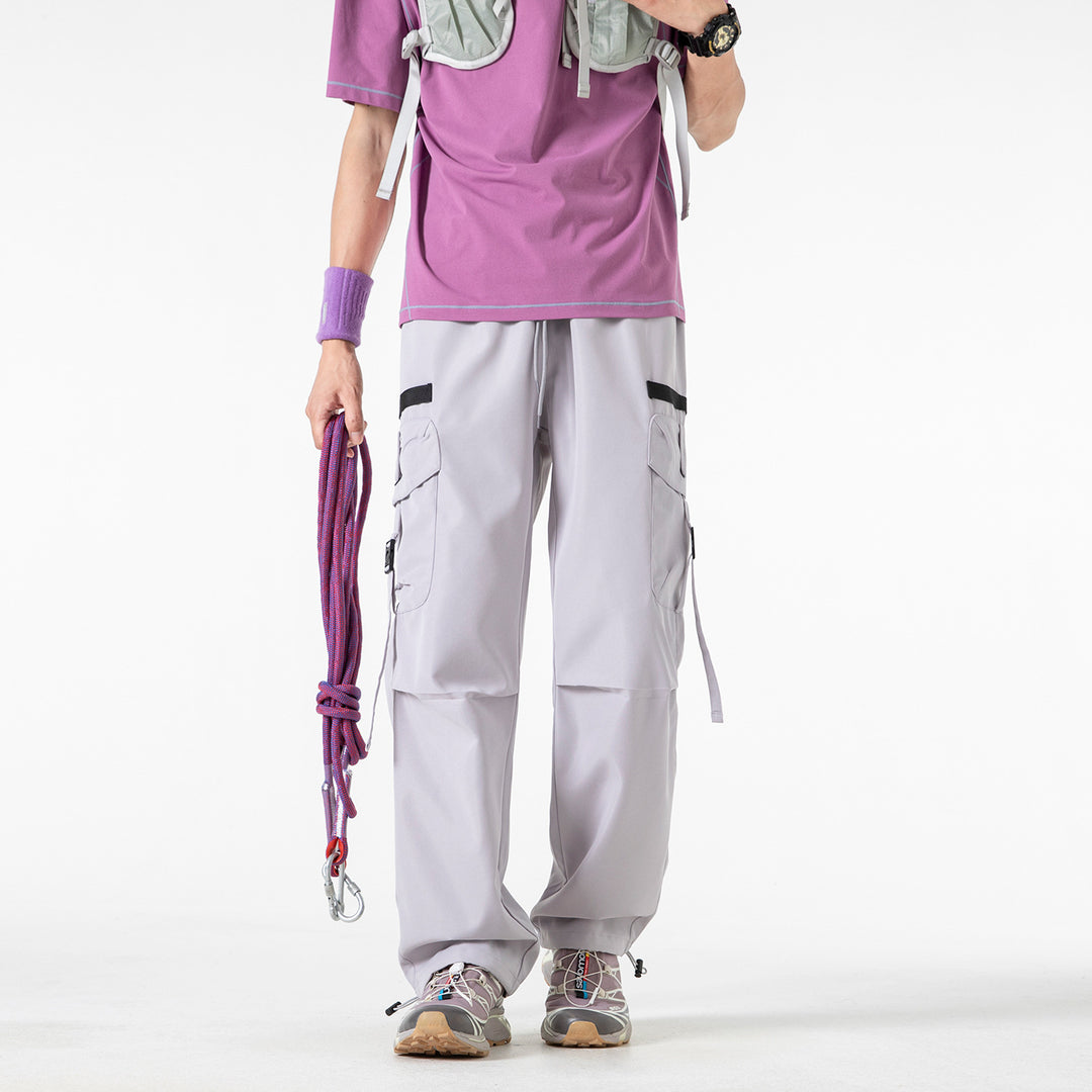 Herren Weite Cargo-Hose mit Multifachtaschen, verstellbarem Tunnelzugbund und modularen Gurt‑Details Drune