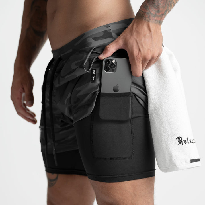 Drune | Doppellagige Shorts mit Tasche