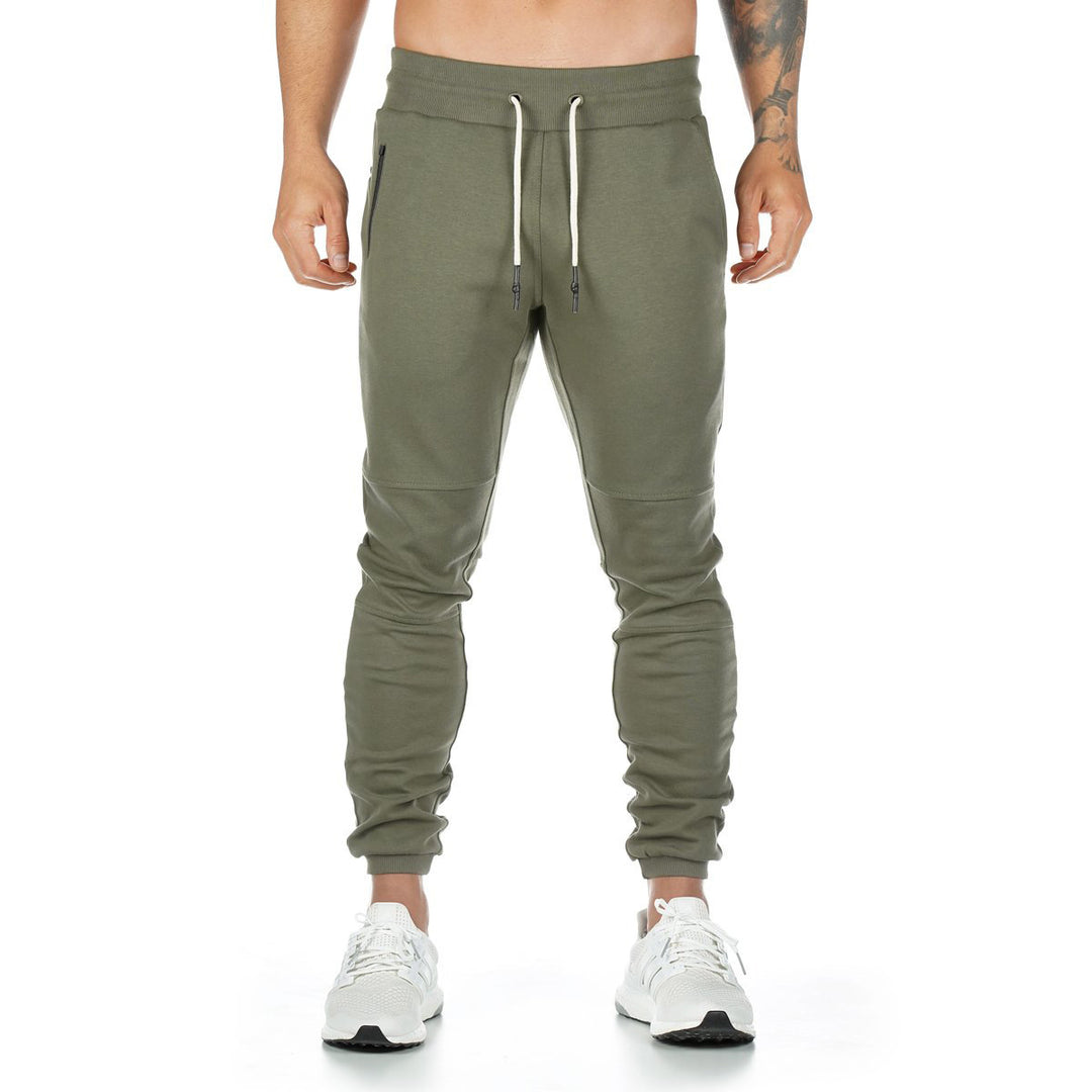 Herren nan schmal geschnittene Jogginghose mit Rippbund, Reißverschlusstasche und Knieabnähern Drune