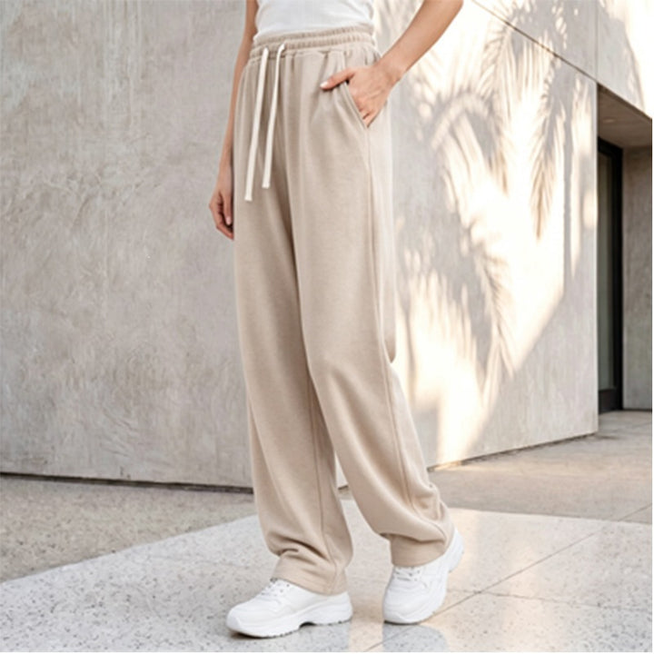 Damen nan weite Loungepalazzo-Hose mit hohem Komfortbund, Kordelzug, seitlichen Eingrifftaschen und dekorativer Seitennaht Drune