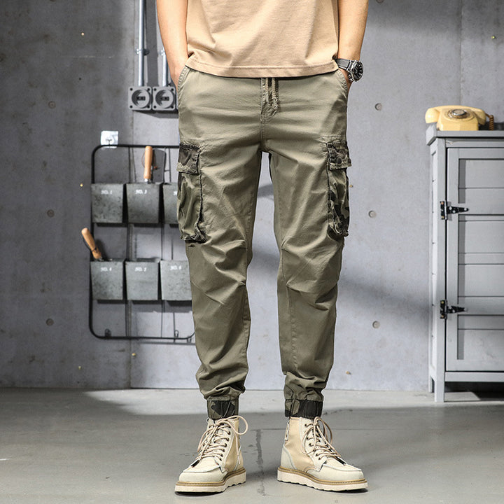 Herren Outdoor‑Cargohose im Joggerstil mit Camouflage‑Kontrast, ergonomischen Knieabnähern und elastischem Komfortbund Drune