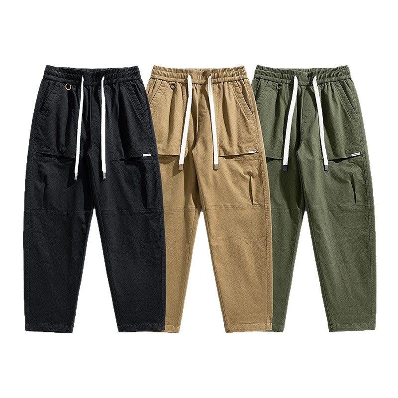 Herren Baggy-Utility-Cargohose im Tapered-Schnitt mit elastischem Tunnelzugbund, aufgesetzten Fronttaschen und Knieabnähern Drune