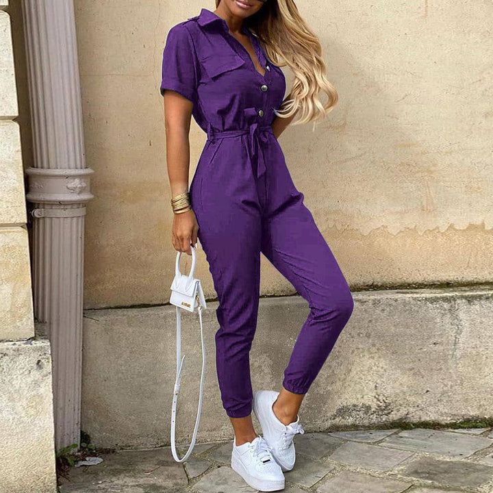 Damen figurbetonter Kurzoverall mit Knopfleiste und taillierbarem Gürtel Drune