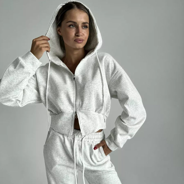 Damen gekürzte Zip-Kapuzenjacke mit formender Taillennaht und relaxed High-Waist Loungehose Drune