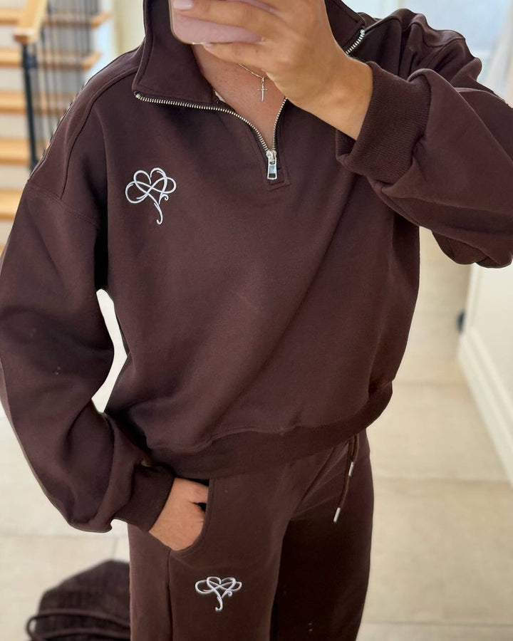 Damen sportlicher Sweater mit halbem Reißverschluss und kontrastierendem Logo Drune