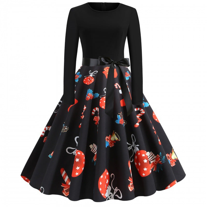 Damen Retro Swingkleid mit Jersey‑Oberteil, taillierter Satin‑Schärpe und festlichem Print Drune