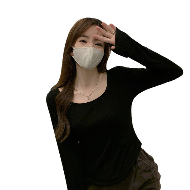 Damen Langarmshirt mit schickem Rundhalsausschnitt und figurbetontem Schnitt