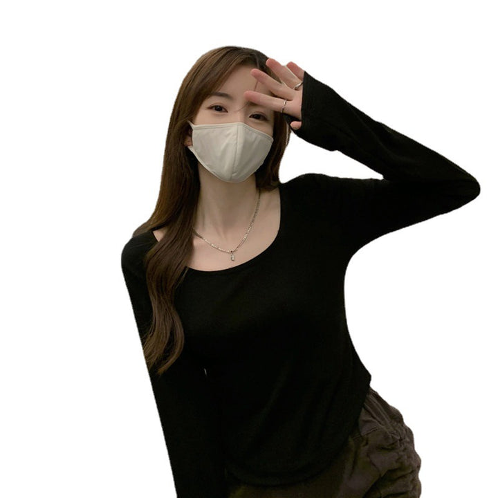 Damen Langarmshirt mit schickem Rundhalsausschnitt und figurbetontem Schnitt
