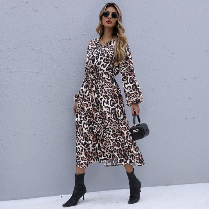 Damen Midikleid Vintage-inspirierter Leoprint mit V-Ausschnitt, elastischer Taillenpasse und Glockenärmeln Drune
