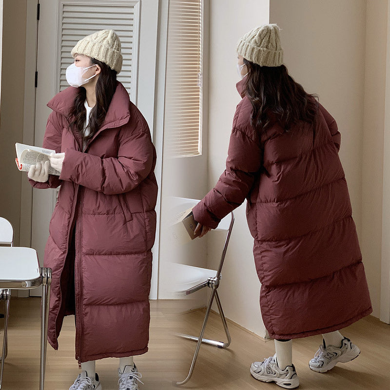 Damen Lange Pufferjacke mit Kapuze und voluminösem Schnitt Drune