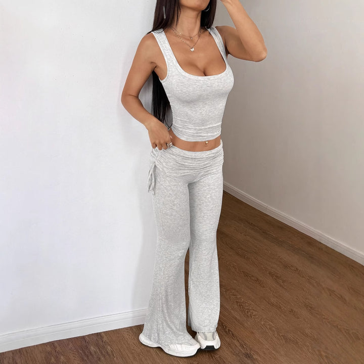 Damen Legere Sportbekleidung mit figurformendem Oberteil und weiten Hosen Drune