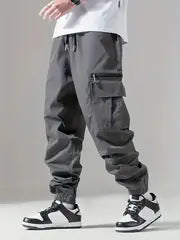 Herren Twill-Cargo-Jogginghose mit Reißverschluss-Beintasche & Tunnelzugbund Drune