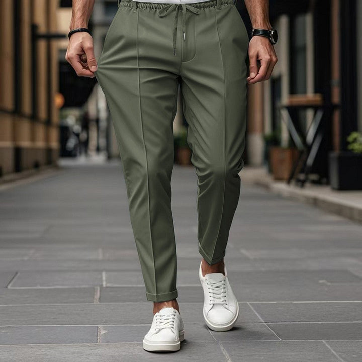 Herren nan moderne tapered Jogginghose mit Bügelfalte und Kordelzug Drune