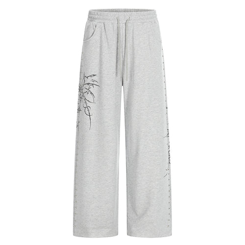 Damen Weite Sweatpants mit Tunnelzug, Ziernieten und grafischem Print Drune