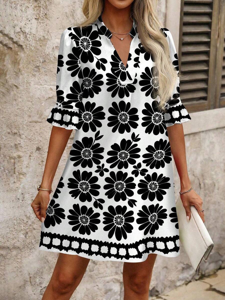 Damen Kurz A-Linien-Kleid mit V-Ausschnitt und großen Blumenmotiven Drune