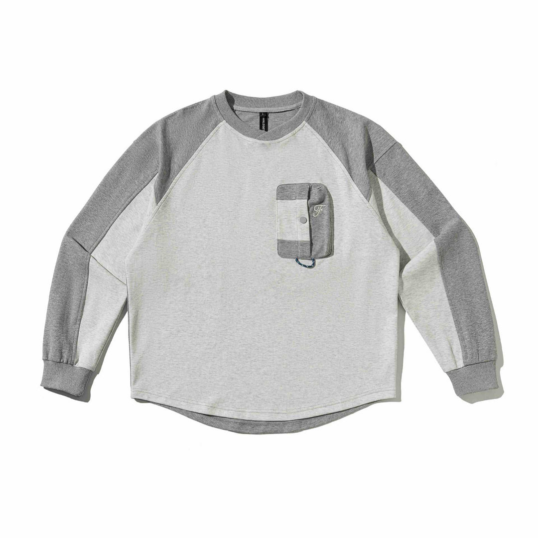 Unisex Raglan‑Sweatshirt mit halbrundem Saum und aufgesetzter Brusttasche Drune