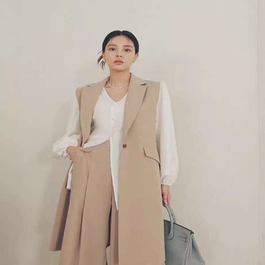 Damen Ärmellose Longweste im Tailoring mit Pattentaschen und einreihiger Knopfleiste Drune