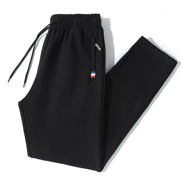 Herren Tapered-Jogginghose mit Tunnelzug, Reißverschlusstasche & Rippbündchen Drune