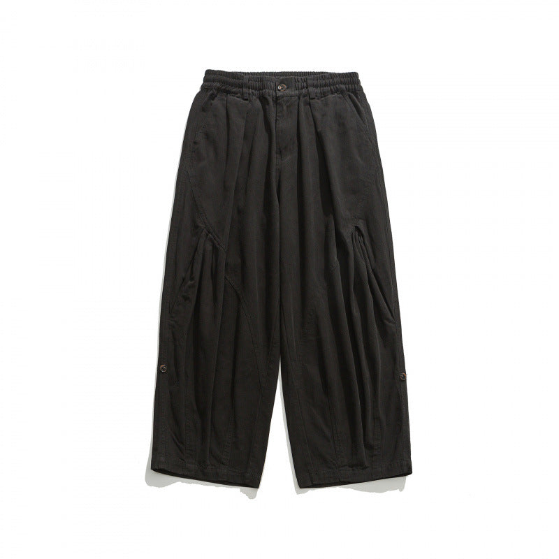 Unisex Weite Plissee-Culottehose mit elastischem Bund, tiefen Eingrifftaschen und legerer 3/4‑Länge Drune