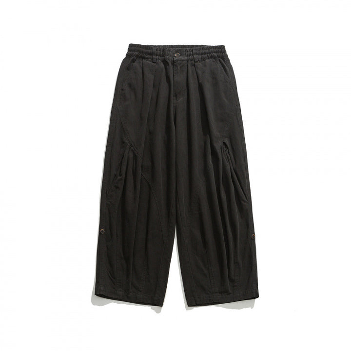 Unisex Weite Plissee-Culottehose mit elastischem Bund, tiefen Eingrifftaschen und legerer 3/4‑Länge Drune