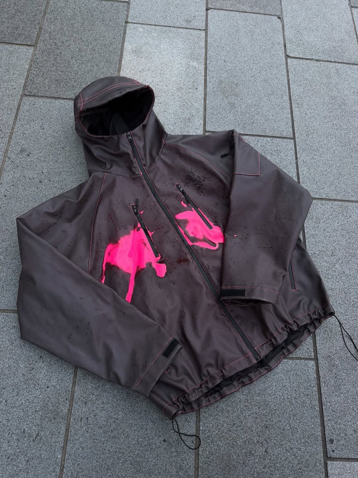 Damen nan wasserdichte Kapuzenjacke mit Spritzdruck-Design, vertikalen Reißverschlusstaschen und verstellbarem Saum Drune