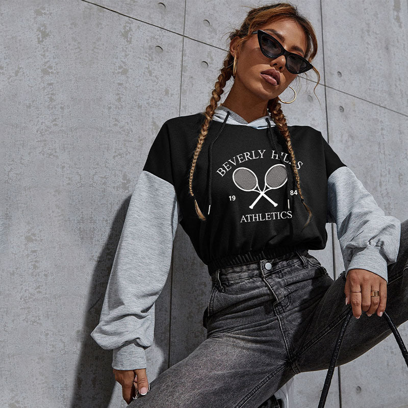 Damen Cropped Hoodie mit Kontrastärmeln, elastischem Saum und schmelzendem Smiley-Print Drune