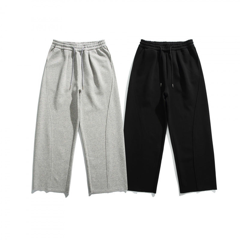 Unisex Weite Baumwoll-Fleece-Jogginghose mit Tunnelzug, Dekorativen Vordernähten und Raw-Saum Drune