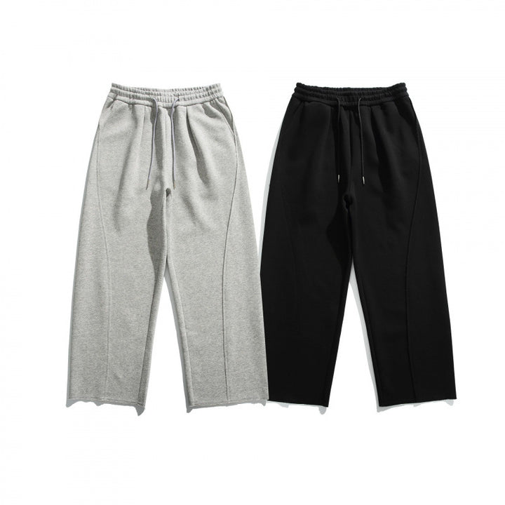 Unisex Weite Baumwoll-Fleece-Jogginghose mit Tunnelzug, Dekorativen Vordernähten und Raw-Saum Drune