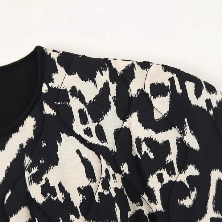 Damen nan gesteppte Kurzjacke mit modernem Animalprint, Rundhalsausschnitt und aufgesetzten Taschen Drune