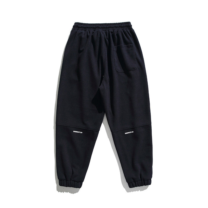 Unisex Weite Jogginghose im Oversize‑Cut mit elastischem Bund, Knie‑Paneel und gerippten Saumbündchen Drune