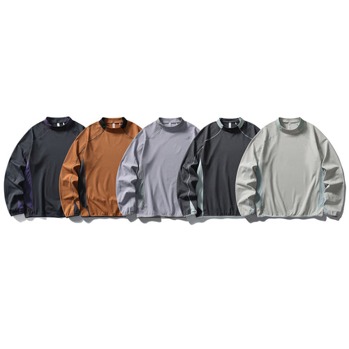 Unisex technisches Mockneck-Longsleeve mit Raglannähten, Kontrast-Einsätzen und elastischem Saum Drune