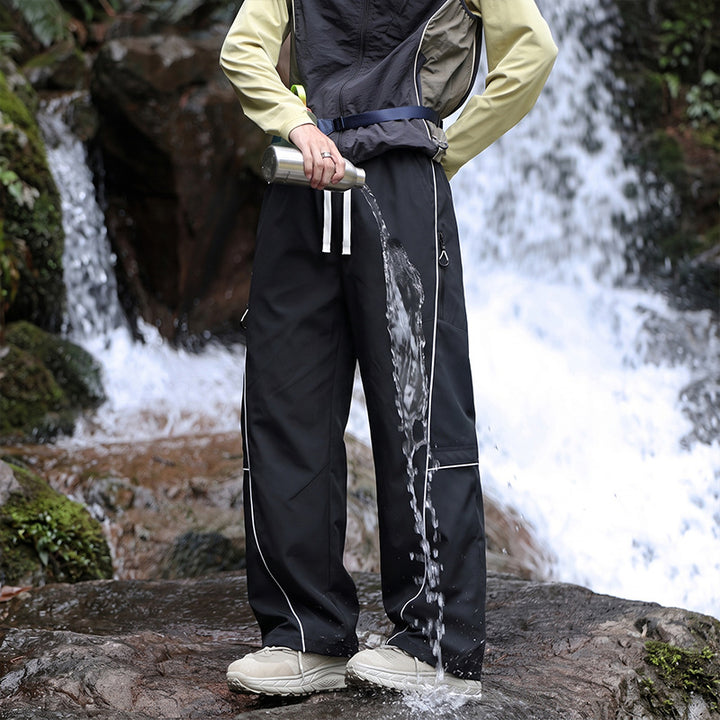 Unisex Wasserabweisende technische Cargo-Hose mit weitem Bein, Reißverschlusstaschen und Kordelzug Drune