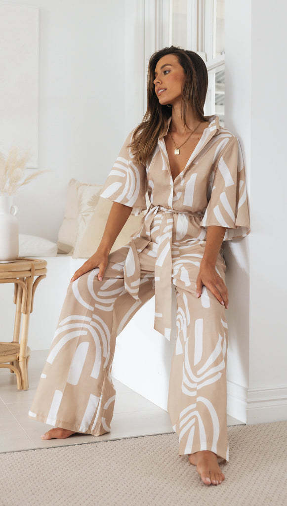 Damen Jumpsuit mit elegantem Bindegürtel und modischem Muster Drune