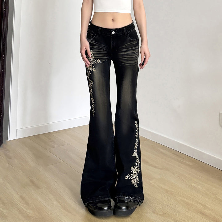 Damen hochtaillierte Schlagjeans mit floraler Stickerei und verwaschenem Look Drune