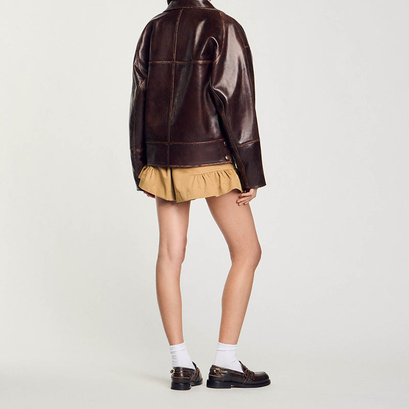 Damen Kurz geschnittene Oversize-Lederjacke mit Rundkragen und Pattentaschen Drune