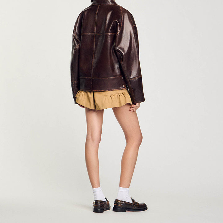 Damen Kurz geschnittene Oversize-Lederjacke mit Rundkragen und Pattentaschen Drune