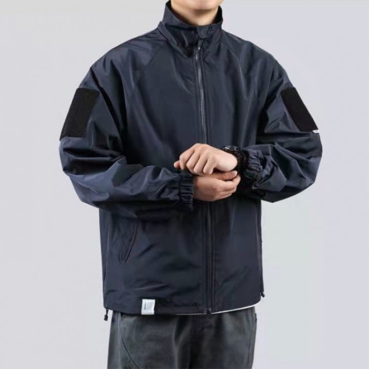 Herren Wind- und Wetterjacke mit funktionalen Taschen und hohem Kragen Drune
